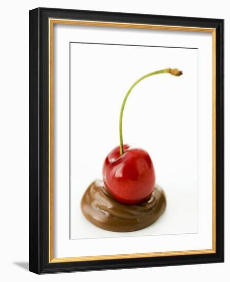 A Cherry on a Blob of Chocolate Sauce-Greg Elms-Framed Photographic Print