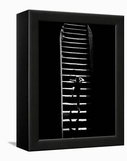 A Child Climbing Stairs-Rip Smith-Framed Premier Image Canvas