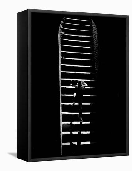 A Child Climbing Stairs-Rip Smith-Framed Premier Image Canvas