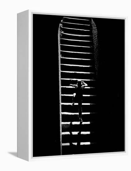 A Child Climbing Stairs-Rip Smith-Framed Premier Image Canvas