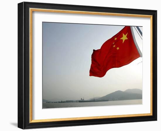 A Chinese Flag Flutters-null-Framed Photographic Print