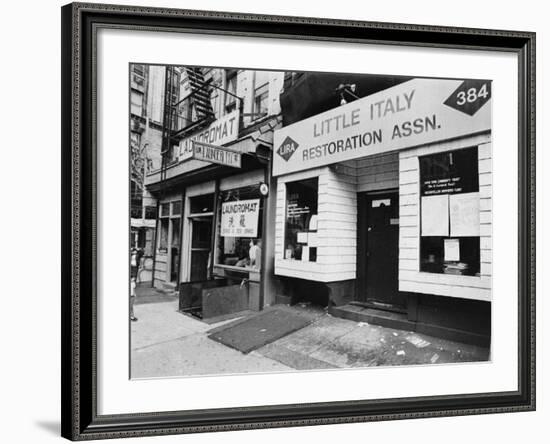 A Chinese Laundromat is Seen Next Door to the Offices of the Little Italy Restoration Association-null-Framed Photographic Print