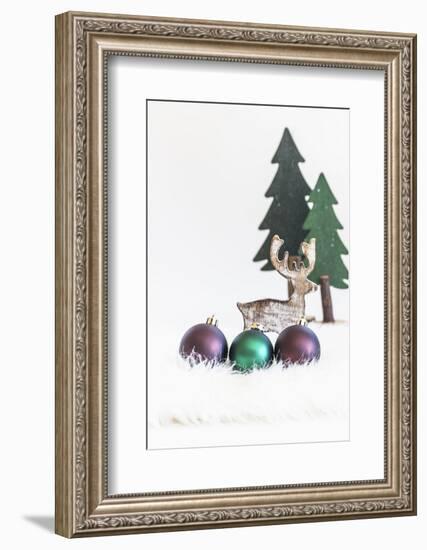 A Christmas Decoration Made of Wood, Fir Trees with Reindeer and Christmas Balls-Petra Daisenberger-Framed Photographic Print