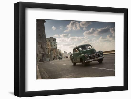 A classic Chevrolet car on the Malecon in Havana, Cuba.-Alex Saberi-Framed Photographic Print