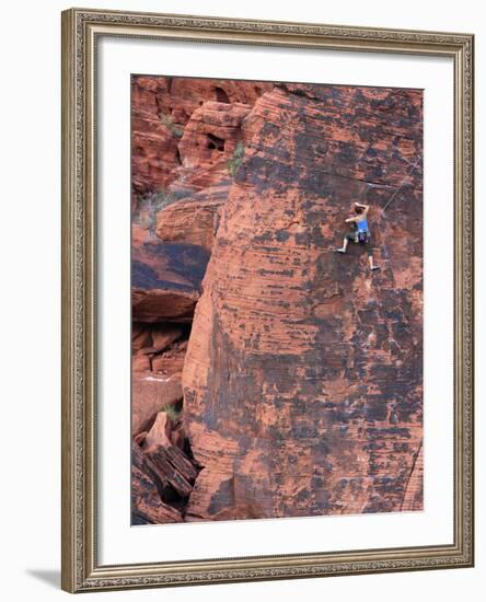 A Climber Ascends a Rock Face-null-Framed Photographic Print