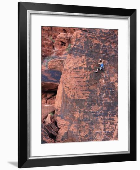 A Climber Ascends a Rock Face-null-Framed Photographic Print