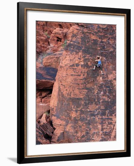 A Climber Ascends a Rock Face-null-Framed Photographic Print