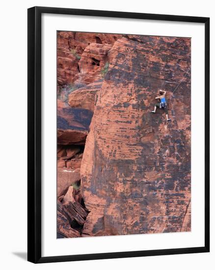 A Climber Ascends a Rock Face-null-Framed Photographic Print