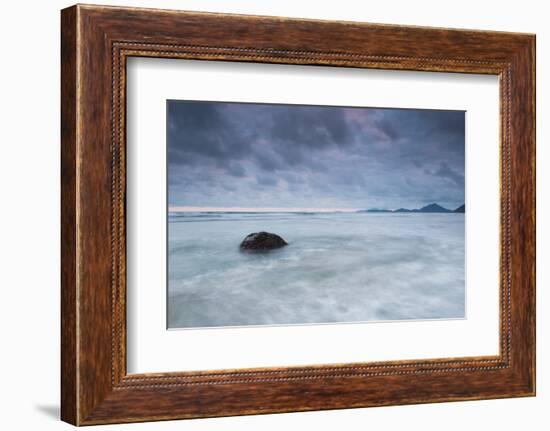 A cloudy but dramatic sunset on Itamambuca beach, Sao Paulo, Brazil.-Alex Saberi-Framed Photographic Print