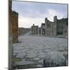 A Cobblestone Roman Road in Pompeii, Italy-null-Mounted Photographic Print