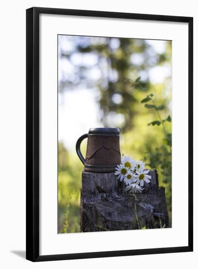 A Coffee Cup Sits In An Old Stump In The Woods Next To A Bouquet Of Daisies Summer In Montana-Hannah Dewey-Framed Photographic Print