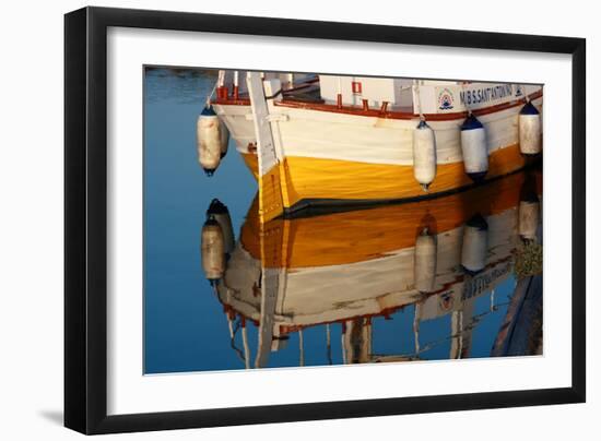 A Colorful Wooden Boat Reflected In The Calm Water Near Marsala, Sicily-Erik Kruthoff-Framed Photographic Print