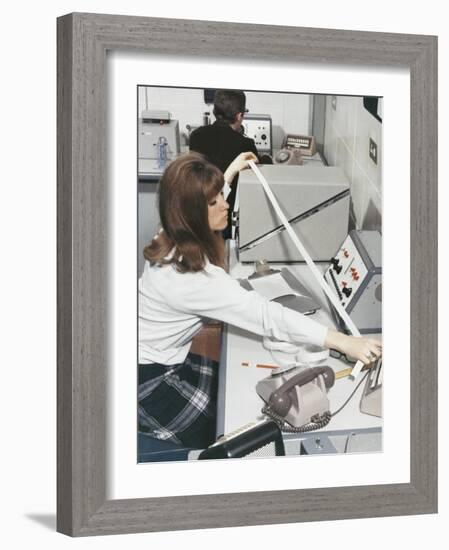 A Computer Technician with Data Tape-Heinz Zinram-Framed Photographic Print