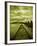 A Concrete Jetty on Water under a Stormy Sky-Cristina Carra Caso-Framed Photographic Print