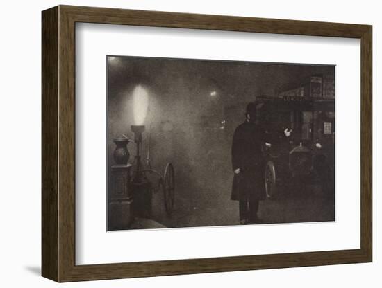 A constable directing traffic in the fog, London, c1910s-c1920s(?)-Unknown-Framed Photographic Print