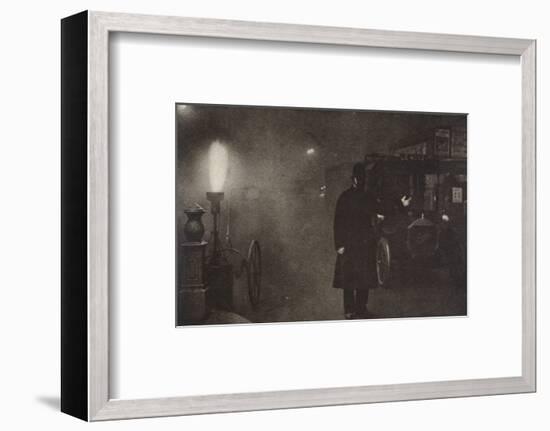 A constable directing traffic in the fog, London, c1910s-c1920s(?)-Unknown-Framed Photographic Print