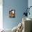 A Construction Worker Stands on a Steel Beam While Working on a High Rise Building-null-Mounted Photographic Print displayed on a wall