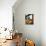 A Construction Worker Stands on a Steel Beam While Working on a High Rise Building-null-Mounted Photographic Print displayed on a wall