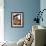 A Construction Worker Stands on a Steel Beam While Working on a High Rise Building-null-Framed Photographic Print displayed on a wall