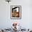 A Construction Worker Stands on a Steel Beam While Working on a High Rise Building-null-Framed Photographic Print displayed on a wall