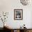 A Cook Holds a Bowl of Cuban Style Black Beans at La Carreta Restaurant, 1987-null-Framed Photographic Print displayed on a wall