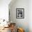 A Cook Holds a Bowl of Cuban Style Black Beans at La Carreta Restaurant, 1987-null-Framed Photographic Print displayed on a wall