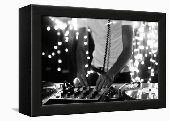 A Cool Male Dj on the Turntables-dubassy-Framed Premier Image Canvas