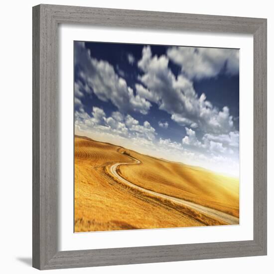 A Country Road in Field Against Moody Sky, Tuscany, Italy-null-Framed Photographic Print