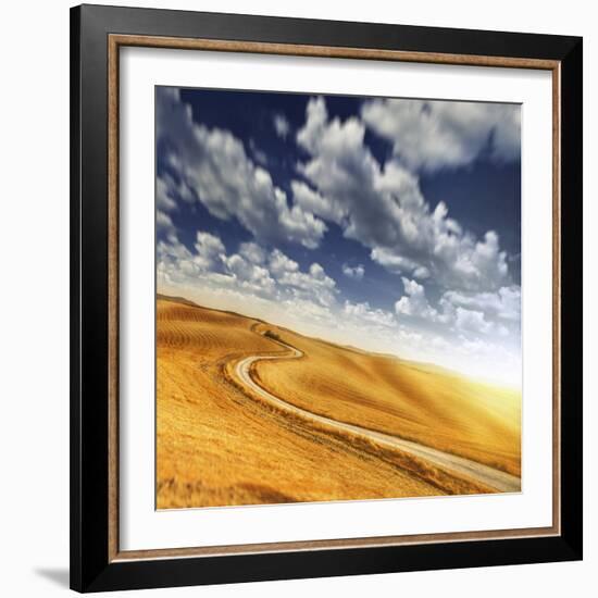 A Country Road in Field Against Moody Sky, Tuscany, Italy-null-Framed Photographic Print