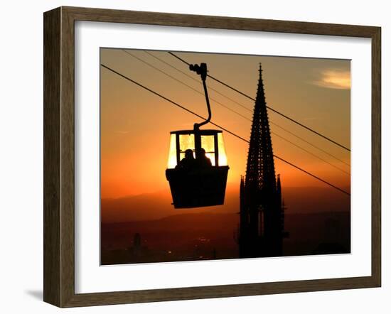 A Couple Sit in a Gondola in Freiburg, Southwestern Germany-null-Framed Photographic Print