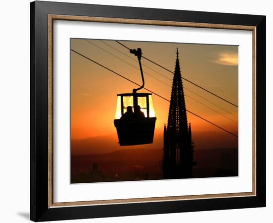 A Couple Sit in a Gondola in Freiburg, Southwestern Germany-null-Framed Photographic Print