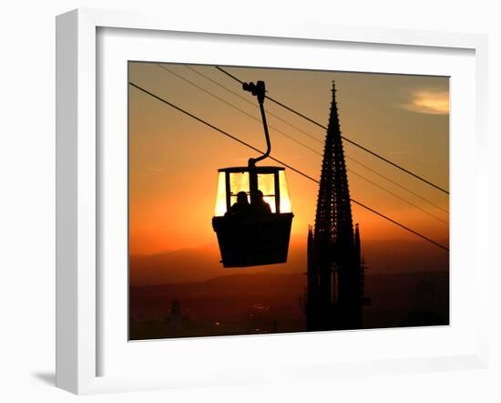 A Couple Sit in a Gondola in Freiburg, Southwestern Germany-null-Framed Photographic Print