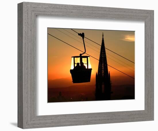 A Couple Sit in a Gondola in Freiburg, Southwestern Germany-null-Framed Photographic Print