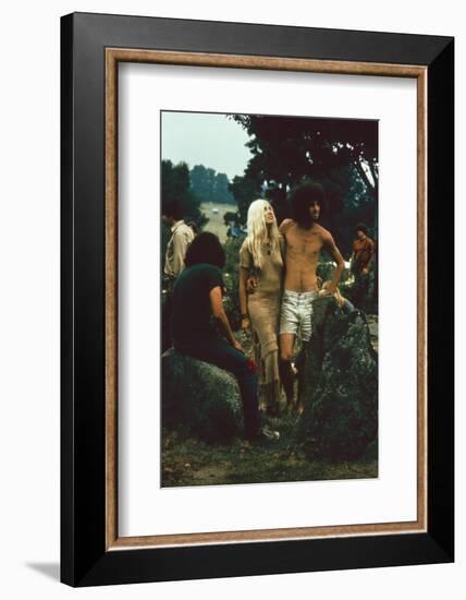 A Couple Stand Together at the Woodstock Music and Arts Fair, Bethel, New York, August 1969-John Dominis-Framed Photographic Print