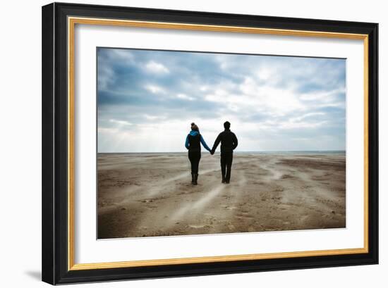 A Couple Together on a Winters Day on a Beach-Clive Nolan-Framed Photographic Print