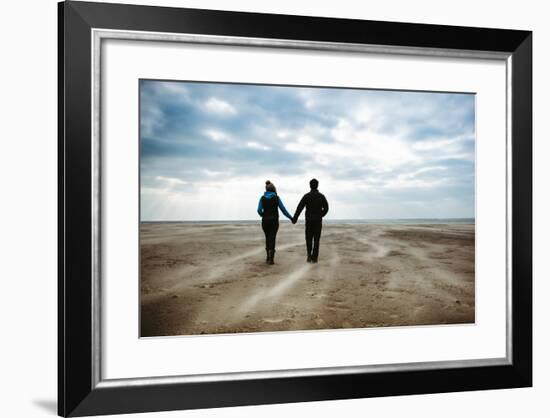 A Couple Together on a Winters Day on a Beach-Clive Nolan-Framed Photographic Print