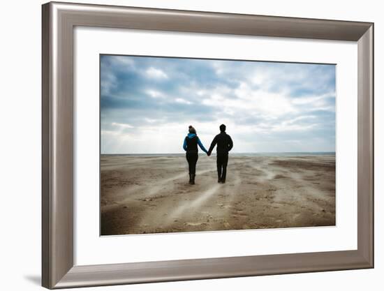 A Couple Together on a Winters Day on a Beach-Clive Nolan-Framed Photographic Print