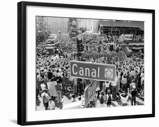 A Crowed Gathers as Floats Make Their Way Through Canal Street During the Mardi Gras Celebration-null-Framed Photographic Print