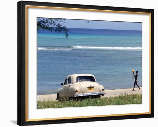 A Cuban Boy Plays Ball at the Baracoa Beach West of Havana, Cuba-null-Framed Photographic Print