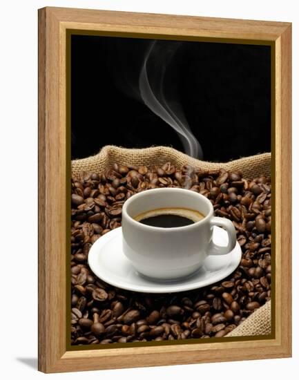 A Cup of Coffee on a Jute Sack Full of Coffee Beans-Gustavo Andrade-Framed Premier Image Canvas
