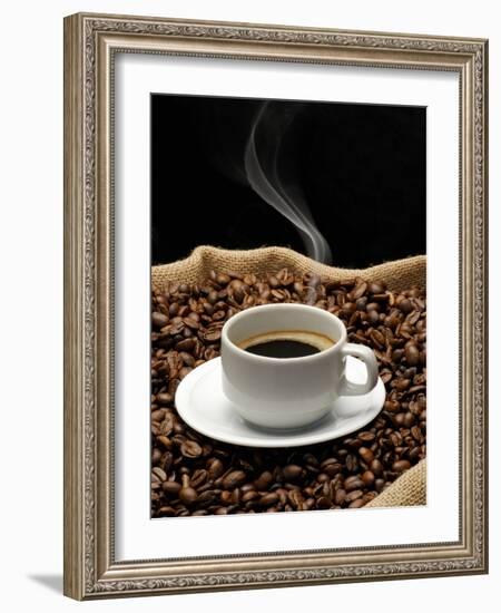 A Cup of Coffee on a Jute Sack Full of Coffee Beans-Gustavo Andrade-Framed Photographic Print