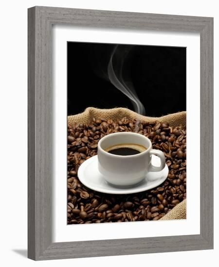 A Cup of Coffee on a Jute Sack Full of Coffee Beans-Gustavo Andrade-Framed Photographic Print