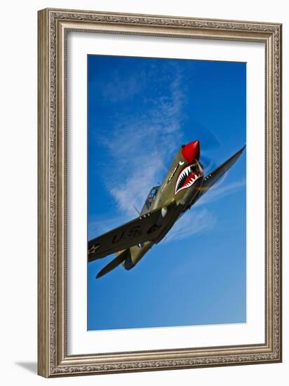 A Curtiss P-40E Warhawk in Flight Near Chino, California-null-Framed Photographic Print