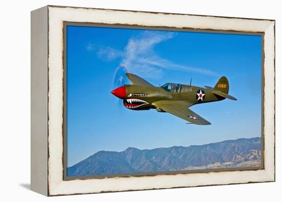 A Curtiss P-40E Warhawk in Flight Near Chino, California-null-Framed Premier Image Canvas