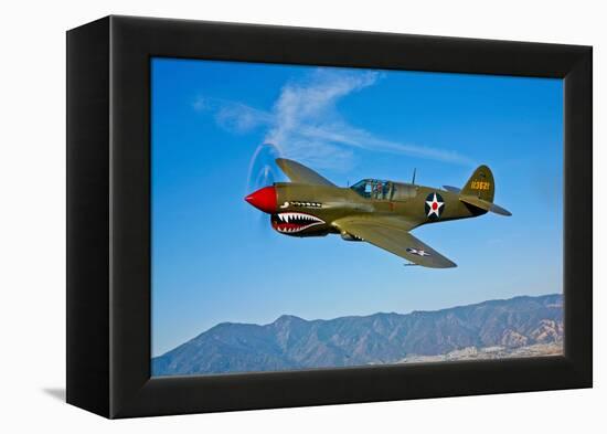 A Curtiss P-40E Warhawk in Flight Near Chino, California-null-Framed Premier Image Canvas