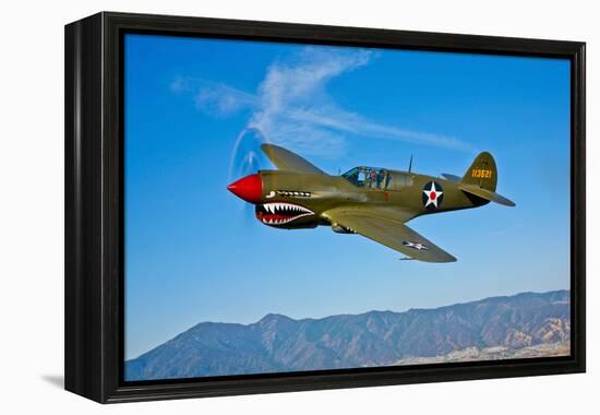 A Curtiss P-40E Warhawk in Flight Near Chino, California-null-Framed Premier Image Canvas