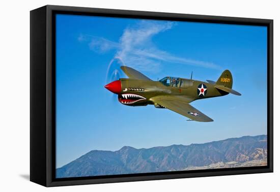 A Curtiss P-40E Warhawk in Flight Near Chino, California-null-Framed Premier Image Canvas