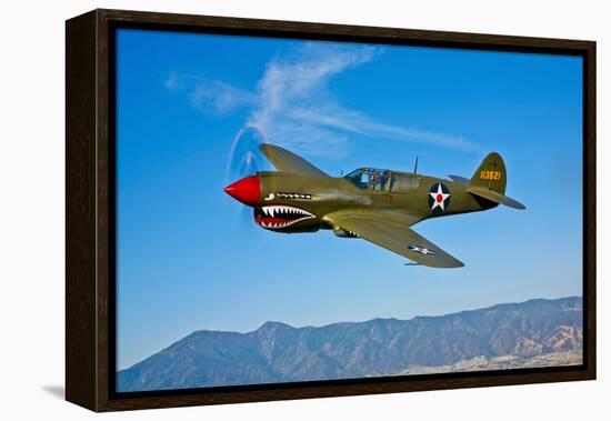 A Curtiss P-40E Warhawk in Flight Near Chino, California-null-Framed Premier Image Canvas