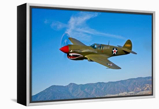 A Curtiss P-40E Warhawk in Flight Near Chino, California-null-Framed Premier Image Canvas