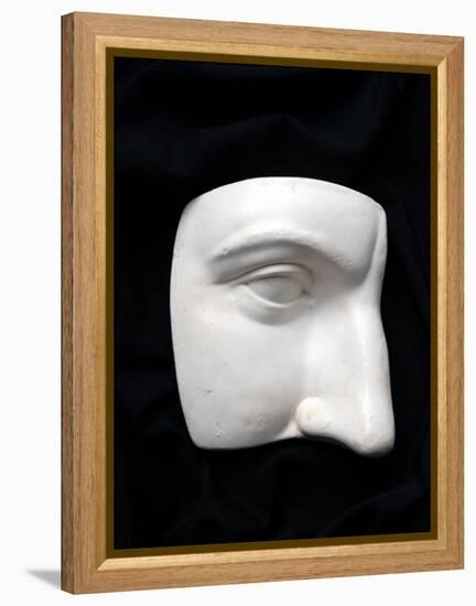 A Cut Out of a Sculpture Including a Man's Face-Winfred Evers-Framed Premier Image Canvas